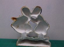 Cast Kissing Couple Door Stop