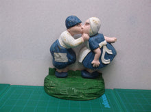 Cast Kissing Couple Door Stop