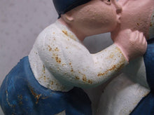 Cast Kissing Couple Door Stop