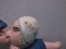 Cast Kissing Couple Door Stop