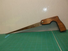 vintage hand saw