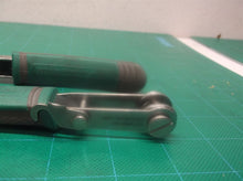 Handle Set Off a Commercial Electric Reversible Pliers