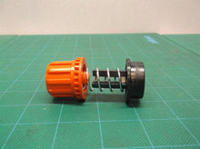 BUTTON 90554396-01N, SPRING 90559866, BUTTON 90556608 off B&D GH900 Trimmer