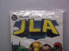JLA Superpower #1 in Near Mint condition. DC comics