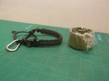 Green & black survival bracelet with cup