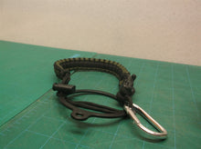 Green & black survival bracelet with cup