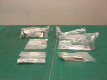 assorted TRUE Door Hinge parts