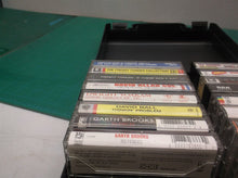 lot of 16 assorted cassette tapes