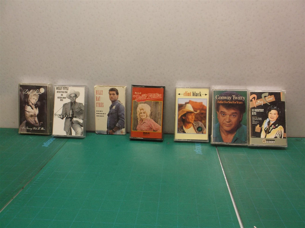 (7) cassette tapes Country genre Black, Parton, Twitty, Tuttle, Cline & Cyrus