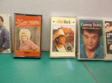 (7) cassette tapes Country genre Black, Parton, Twitty, Tuttle, Cline & Cyrus