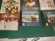 (11) Music CD Christmas lot Manilow 98 Degrees 20 Fav Norman Rockwell Greetings