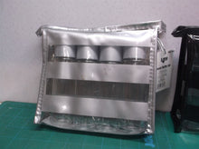 Lot of 2- Travel bottle set- 1 silver-1 black