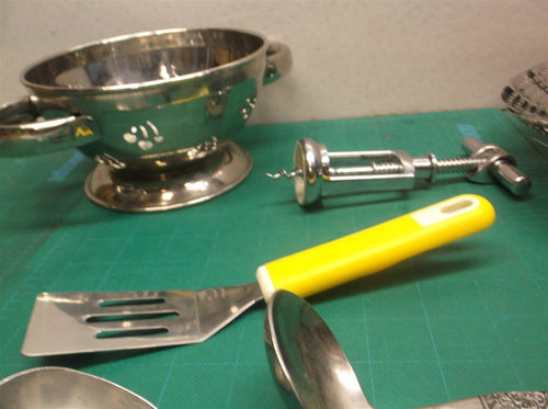 (7) Kitchen Utensils 2 Colander small yellow spatula 2 stainless spoons opener
