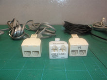 lot of assorted phone cables & splitter