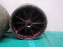 KENMORE 125.31230610- Part #KC99CEDCZSOL- WHEEL UNIT (2)+ 1 ROLLER SHAFT