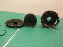 upper head with spool off of Dewalt DSCT922 string trimmer