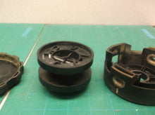 upper head with spool off of Dewalt DSCT922 string trimmer