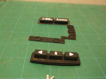 rubber buttons & screws from a Rain Bird 1ZEHTMR Garden Hose Watering Timer