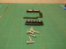 rubber buttons & screws from a Rain Bird 1ZEHTMR Garden Hose Watering Timer