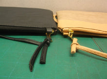 Lot of 2 Toiletry bags- 1 Brown, 1 Black- with straps