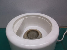 Heating base unit from a Oster Double Tiered Food Steamer 5 Qt White CKSTSTMD5