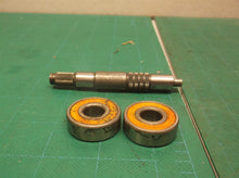 Drive shaft with bearings from a 8" trimmer plus ps720 pole saw attachment