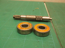 Drive shaft with bearings from a 8" trimmer plus ps720 pole saw attachment
