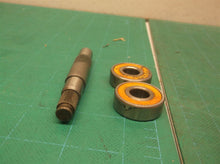 Drive shaft with bearings from a 8" trimmer plus ps720 pole saw attachment