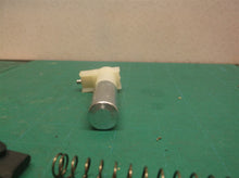 Plunger assembly from a DeWALT dwht75021 5-in-1 Multi-Tacker and Brad Nailer