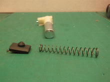 Plunger assembly from a DeWALT dwht75021 5-in-1 Multi-Tacker and Brad Nailer
