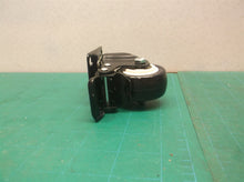 1" caster with wheel lock & rotation lock black