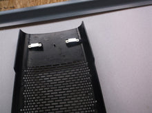 Black front grill off a Hunter Tall Tower Air Purifier hp600