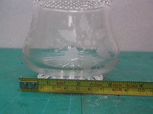Pear shaped candle holder clear glass