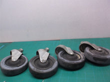lot 0f 4 4" threaded stem casters with nuts