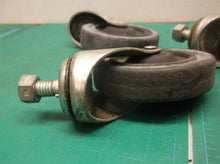 lot 0f 4 4" threaded stem casters with nuts
