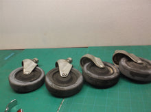 lot 0f 4 4" threaded stem casters with nuts
