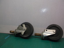 set of 2 6" casters 1 with brake & 1 without shaft measures 7/8