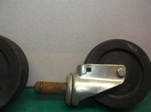 set of 2 6" casters 1 with brake & 1 without shaft measures 7/8