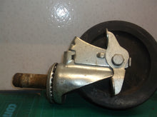 set of 2 6" casters 1 with brake & 1 without shaft measures 7/8