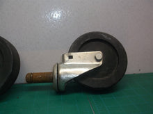set of 2 6" casters 1 with brake & 1 without shaft measures 7/8