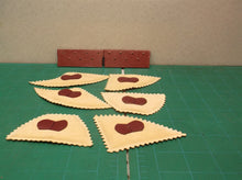 8 inserts out of a wolf designs red round jewelry box