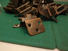lot of 32 bronze hinges with screws