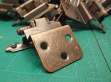 lot of 32 bronze hinges with screws