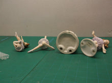 Lot of 4 porcelain figures
