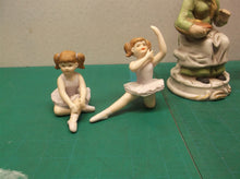 Lot of 4 porcelain figures