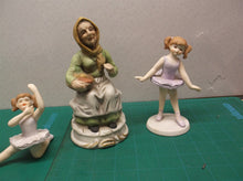 Lot of 4 porcelain figures