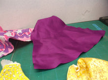 assorted bag of doll cloths