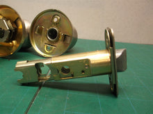 lot of assorted interior door knob parts