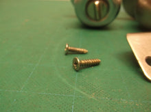 lot of assorted interior door knob parts
