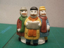 3 christmas carolers table decor